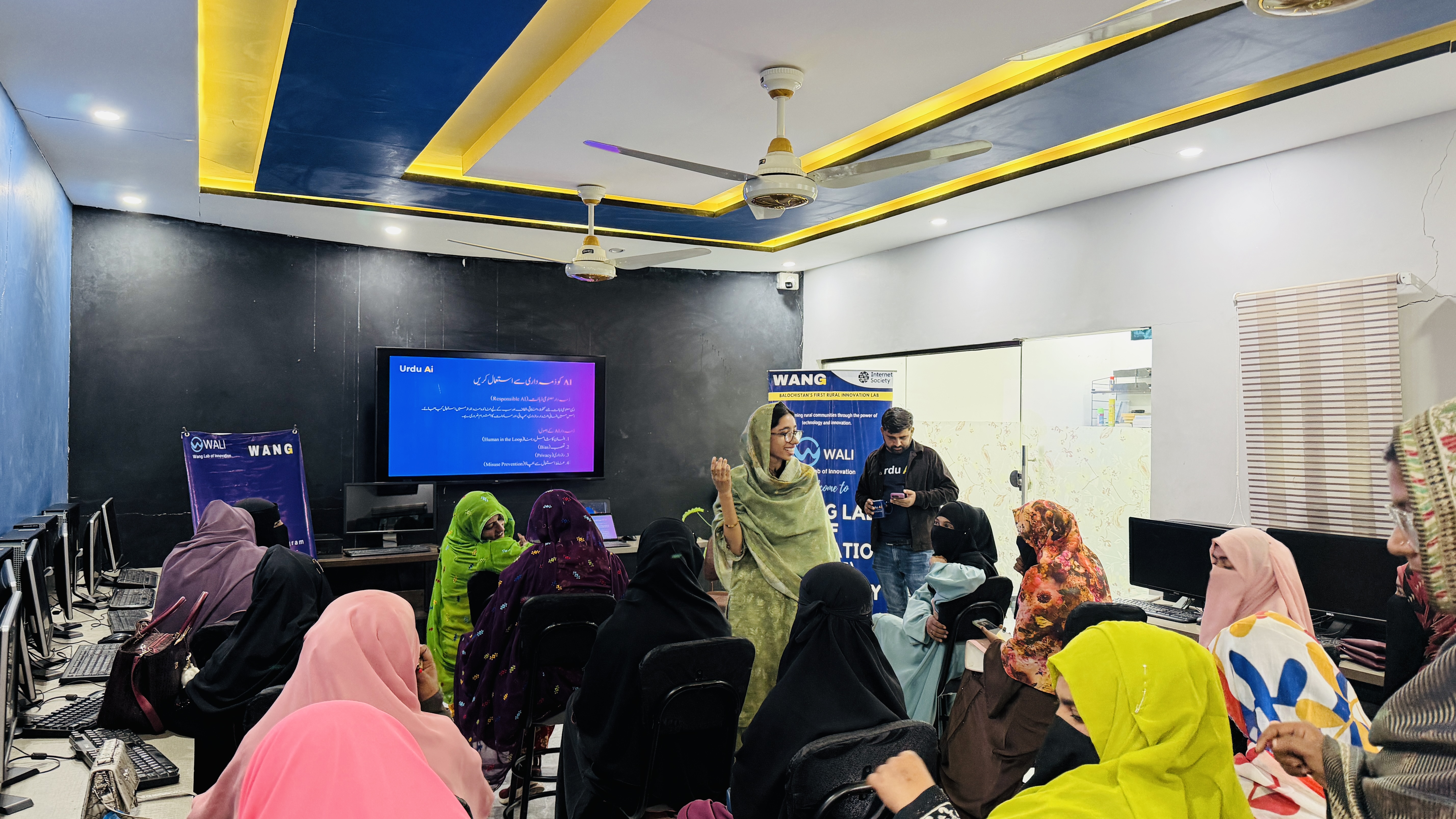 Young learners in a WALI computer session inside the lab